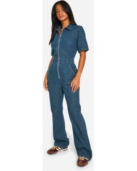 Boohoo - Petite Denim Zip Up Boilersuit - Lyst
