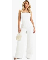 Boohoo - Premium Satin Boned Corset Halterneck Wide Leg Jumpsuit - Lyst