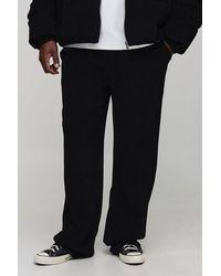 Boohoo - Plus Relaxed Fit Textured Faux Suede Stacked Pants - Lyst