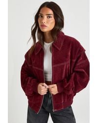 Boohoo - Petite Faux Suede Contrast Stitch Bomber Jacket - Lyst