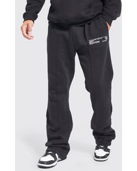 BoohooMAN - Slim Stacked Flare Pintuck Jogger - Lyst