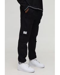 BoohooMAN - Slim Fit Elasticated Waist Cuffed Cargo Pants With Tab - Lyst