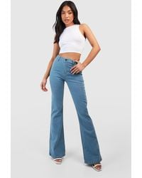 Boohoo - Petite Butt Shaper High Rise Skinny Flared Jeans - Lyst