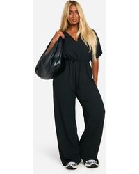 Boohoo - Mono Largo Plus Escotado De Tela Jersey Texturizada Con Cinturón - Lyst