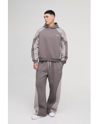 BoohooMAN - Kastiger Oversize Man Trainingsanzug mit Naht-Detail und Kapuze - Lyst