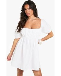 Boohoo - Petite Linen Puff Sleeve Smock Mini Dress - Lyst
