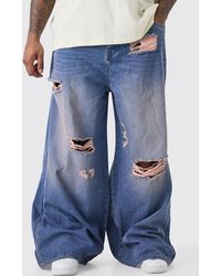 BoohooMAN - Plus Extreme Baggy Overdyed Frayed Self Fabric Applique Jean - Lyst
