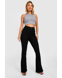Boohoo - High Waisted Butt Shaping Skinny Split Hem Flared Jeans - Lyst