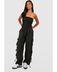 Boohoo - Petite Shell Toggle Pocket Detail Cargo Trousers - Lyst
