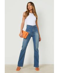Boohoo Pocket Front Mid Rise Flared Jeans - Blue