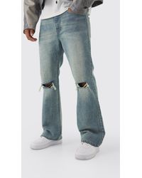 BoohooMAN - Relaxed Rigid Flare Jean With Knee Rips - Lyst