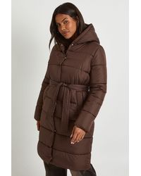 Boohoo - Belted Longline Puffer Jacket - Lyst