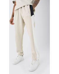 BoohooMAN - Tall Colour Block Branded Joggers In Stone - Lyst