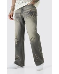 BoohooMAN - Tall Relaxed Rigid Flare Self Fabric Applique Gusset Jeans - Lyst