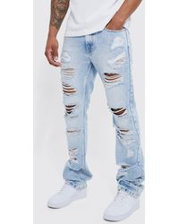 BoohooMAN - Slim Flare Jeans With All Over Rips - Lyst