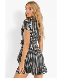 green sprinkle print ruffle wrap tea dress