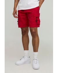 BoohooMAN - Elasticated Waist Baggy Fit Crinkle Nylon Cargo Shorts - Lyst
