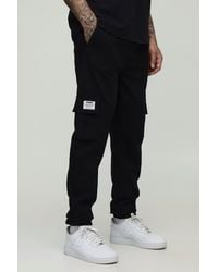 BoohooMAN - Tall Slim Fit Elasticated Waist Cuffed Cargo Pants With Tab - Lyst