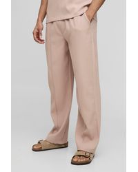 BoohooMAN - Relaxed Fit Elasticated Waist Pleated Pants - Lyst