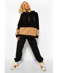 black colour block borg trucker jacket