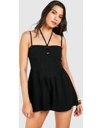 Boohoo - Linen Lace Up Flippy Playsuit - Lyst