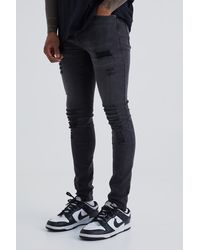 BoohooMAN - Super Skinny Jeans With All Over Rips - Lyst