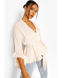 ruffle hem wrap blouse