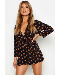 Boohoo Womens Star Print Tie Waist Wrap Romper - Black - 4