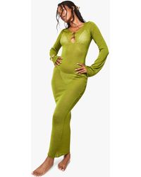 Boohoo - Vestido Maxi Para La Playa De Punto Transparente Con Botones Dorados - Lyst