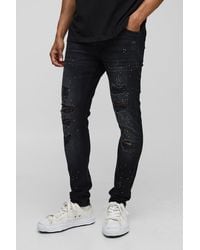 BoohooMAN - Skinny Fit Rhinestone Washed Rip & Repair Jeans - Lyst