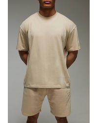 BoohooMAN - Active Training Dept Oversized Embossed T-Shirt & Short Set - Lyst