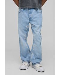 BoohooMAN - Zerrissene Slim-Fit Schlagjeans mit Kreuz-Stickerei - Lyst
