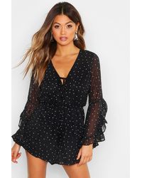 Boohoo Womens Polka Dot Flare Ruffle Sleeve Romper - Black