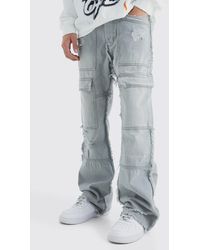 BoohooMAN - Relaxed Rigid Flare Frayed Edge Cargo Jeans - Lyst