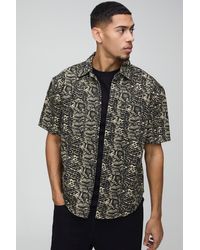 Boohoo - Oversized Washed Twill Warped Snake Print Shirt - Lyst