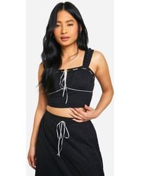 Boohoo - Petite Broderie Contrast Bow Top - Lyst