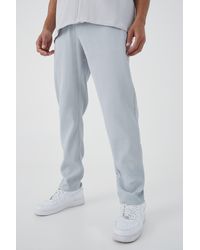 BoohooMAN - Tall Elastic Waist Tapered Fit Pleated Trouser - Lyst