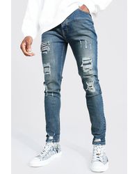 BoohooMAN - Skinny Stretch Rip And Repair Scratch Jeans - Lyst