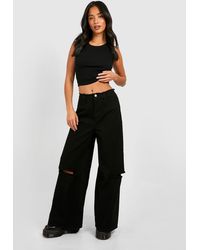 Boohoo - Petite Low Rise Washed Wide Leg Jean - Lyst