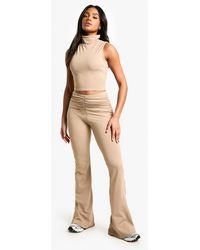 Boohoo - Sculpting Matte Slinky Ruched Detail Flare Pants - Lyst