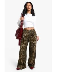 Boohoo - Petite Faded Denim Leopard Print Wide Leg Jean - Lyst