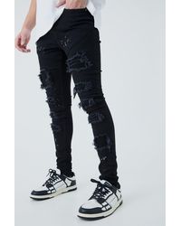 BoohooMAN - Super Skinny Pu Biker Rip & Repair Paint Splatter Jeans - Lyst