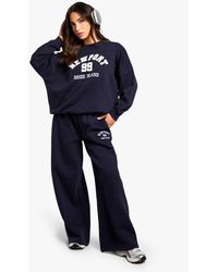 Boohoo - Petite Embroidered Wide Leg Jogger - Lyst