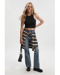 Boohoo - Petite Comfort Stretch High Waist Flared Jean - Lyst
