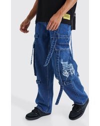 BoohooMAN - Baggy Rigid Strap Detail Distressed Cargo Jeans - Lyst