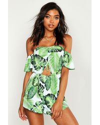 caroline flack beige print wrap playsuit