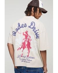 Boohoo - Camiseta Oversize Recta Con Cuello Extendido Y Estampado Gráfico Rodeo Drive Western - Lyst