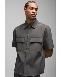Technic - Camisa Oversize Técnica Plisada Con Bolsillos Cargo - Lyst