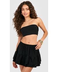Boohoo - Eylet Lace Low Rise Tiered Frill Mini Skirt - Lyst