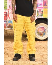 Boohoo - Relaxed Rigid Hyper Distressed Overdye Denim Jean In Yellow - Lyst